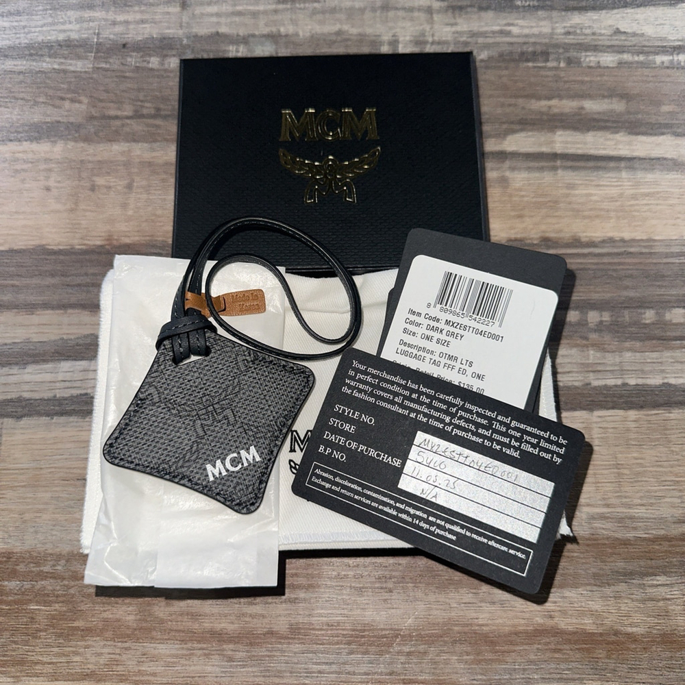 Authentic MCM Travel AirTag Holder Leather Case New With Box, Dust Bag, And COA